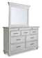 Kanwyn King Panel Bed with Storage with Mirrored Dresser, Chest and Nightstand