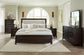 Neymorton Queen Upholstered Panel Bed with Mirrored Dresser and 2 Nightstands