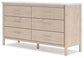 Cadmori Queen Upholstered Panel Bed with Dresser